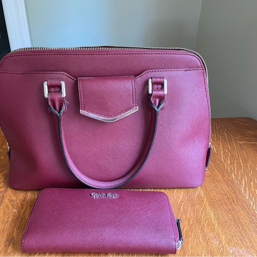 Large Calvin Klein purse, deep red, with matching wallet.
